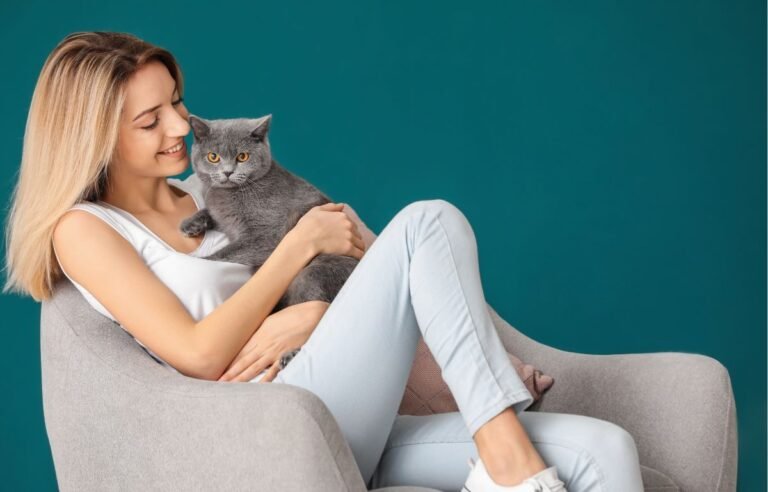 Why does my cat choose one person to love most while resting calmly with a trusted human